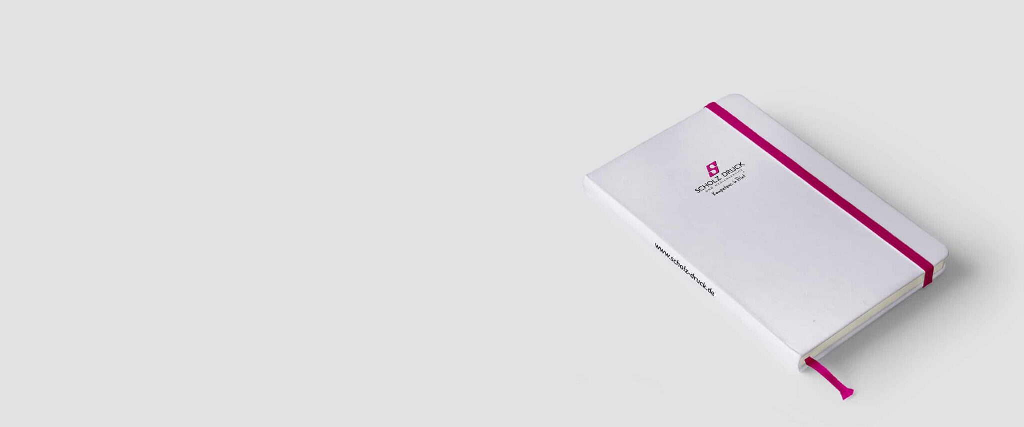 Notizbuch weiß mit Leselitze und Band in Magenta Druckerei Fadenheftung