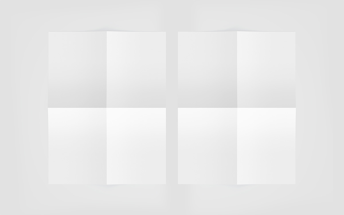 2x Papier unbedruckt aufgeklappt Kreuzfalz Beispielfoto mit sichtbaren Falten